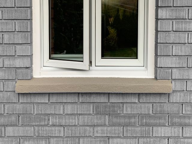 Réparation de béton d'allège de fenêtre